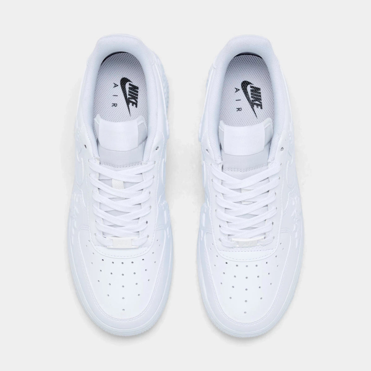 Women's Rose Embossed Low Top Sneakers