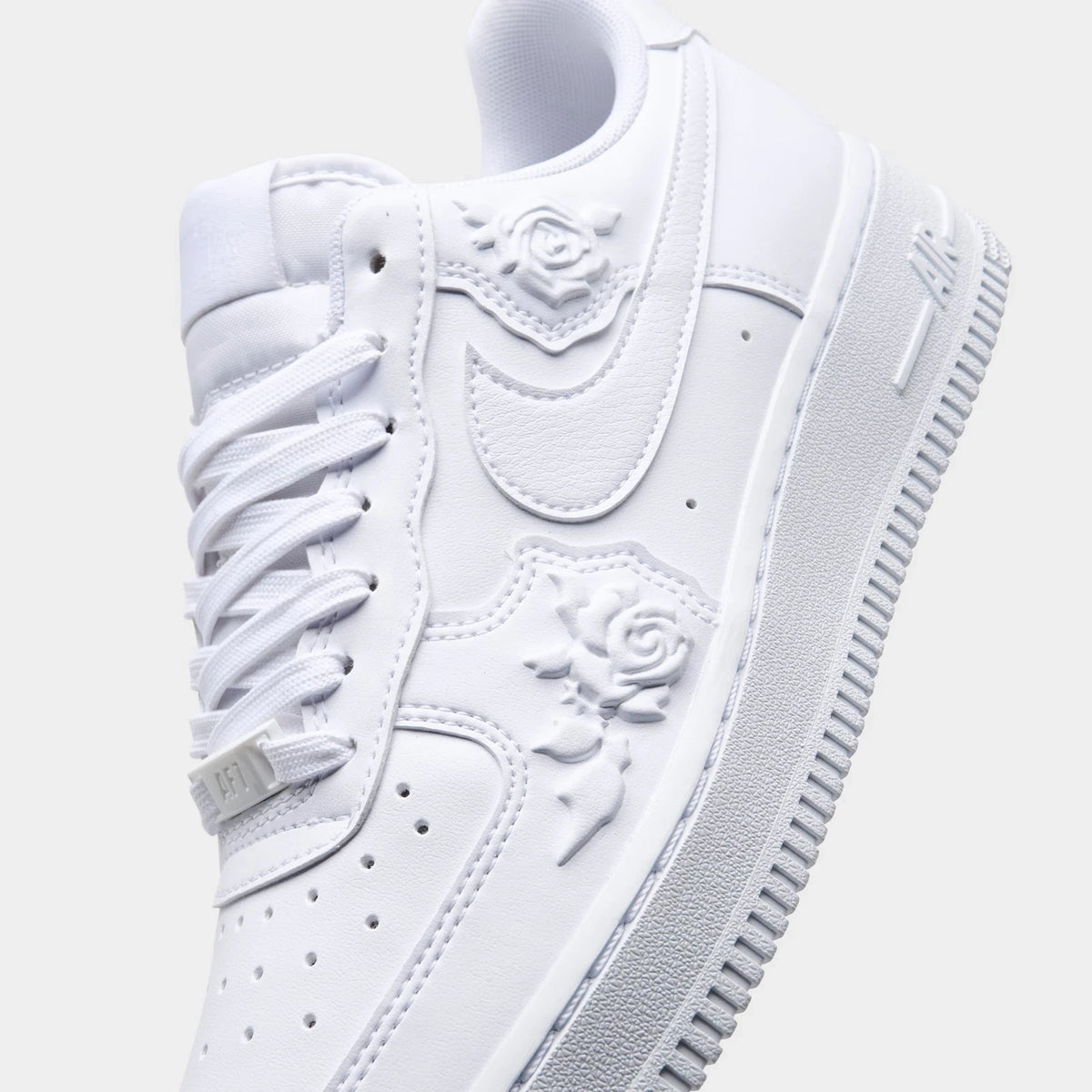 Women's Rose Embossed Low Top Sneakers