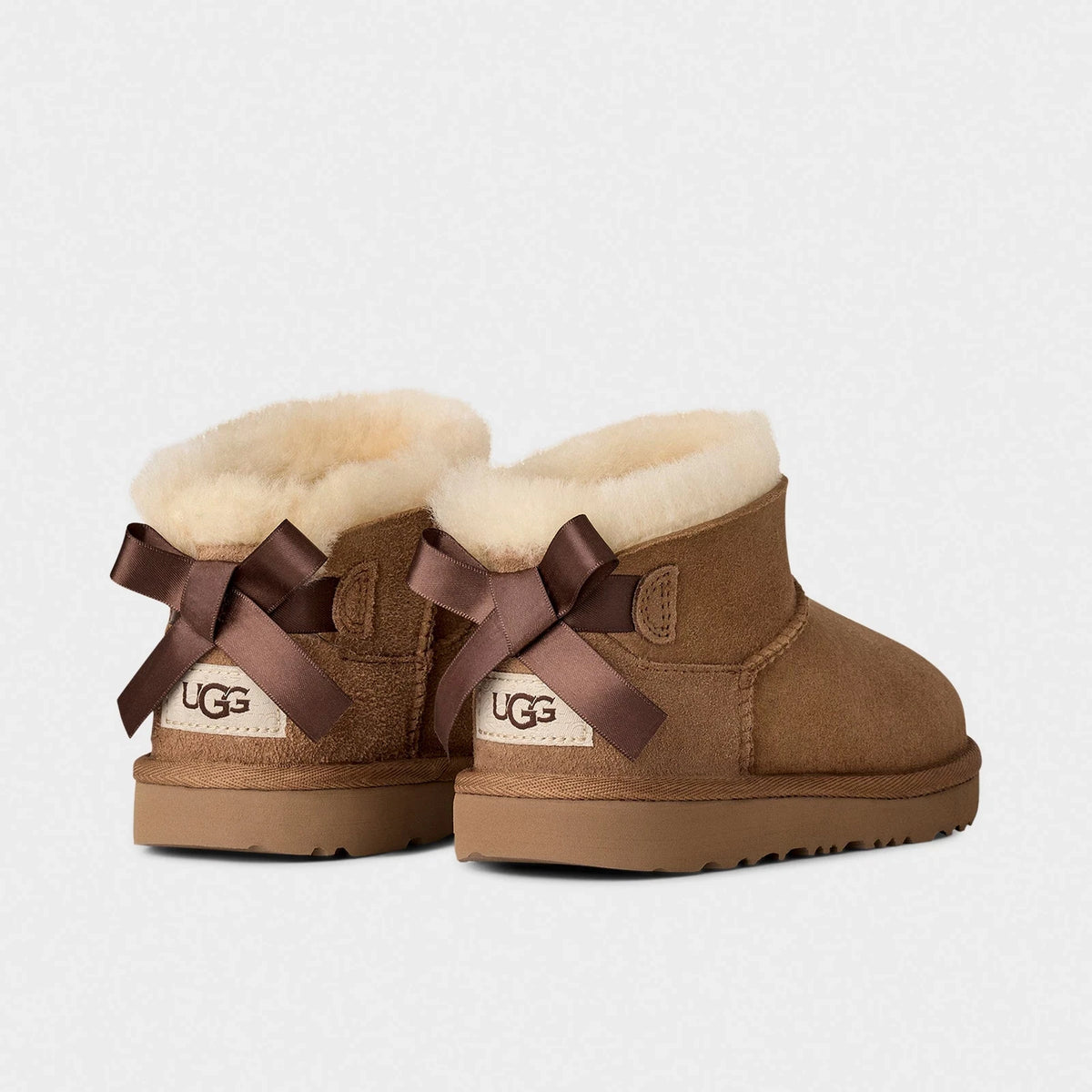 Girls' Short Sheepskin Boots With Satin Bows