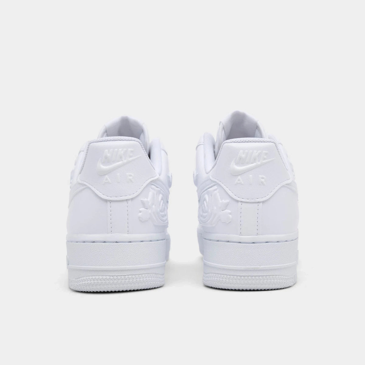 Women's Rose Embossed Low Top Sneakers